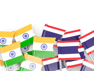 Pins with flags of India and thailand isolated on white.