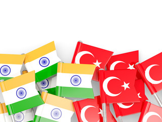 Pins with flags of India and turkey isolated on white.