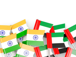 Pins with flags of India and united arab emirates isolated on white.