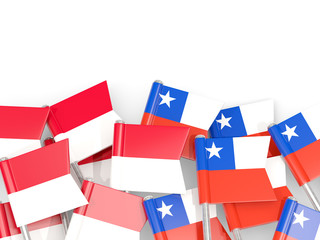 Pins with flags of Indonesia and chile isolated on white.