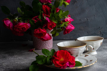 Tea set with red roses