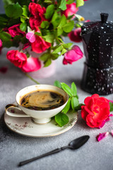 Coffee time with red roses