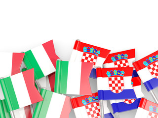 Fototapeta na wymiar Pins with flags of Italy and croatia isolated on white.