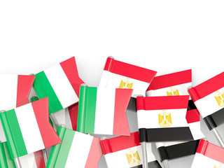 Fototapeta na wymiar Pins with flags of Italy and egypt isolated on white.