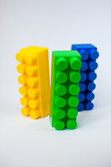 bright details of the children's plastic designer: yellow, blue and green