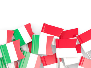 Pins with flags of Italy and indonesia isolated on white.