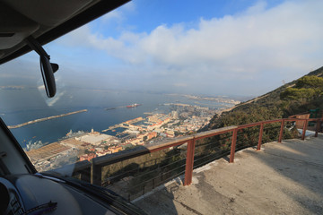 Road on the edge of cliff drive to The Rock Gibraltar harbor