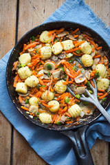 Gnocchi with vegetables and mushrooms. Potato dumplings with carrot, scallions & mushrooms 
