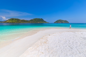 Paradise beach and the blue sky at Khai Island in Satun Province , Thailand