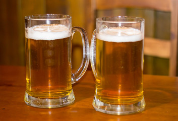 two glasses of beer lager