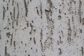 uneven runny grey texture of the wall