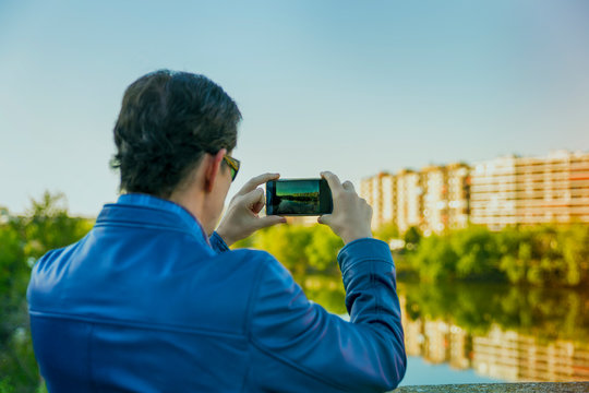traveller taking photo with your smartPhone