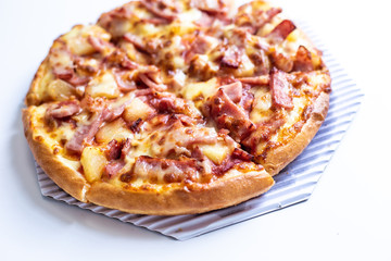 pizza hawaiian with ham cheese close up