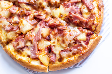 pizza hawaiian with ham cheese close up