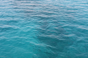 Fototapeta na wymiar surface of blue water