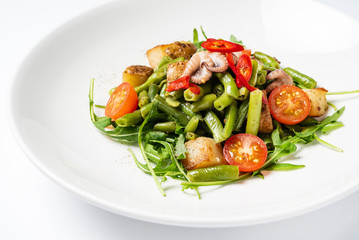 salad with baby octopus and vegetables