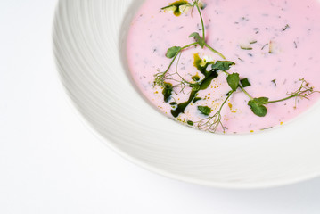 cold beetroot soup on the white background