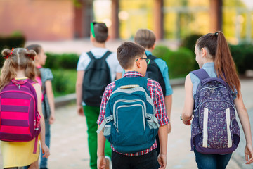 Group of kids going to school together.
