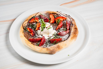 strawberry pizza with chocolate and ice cream
