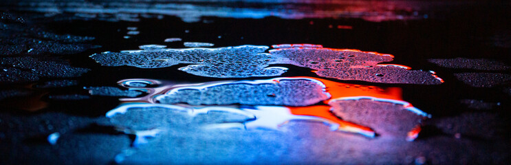 Wet asphalt, night scene of an empty street with a little reflection in the water, the night after the rain. Abstract dark neon background with a wet surface, reflection, neon, glare, blurred bokeh. - obrazy, fototapety, plakaty
