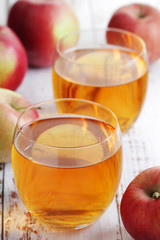 Two glasses with apple juice