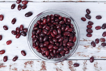 A bowl with red dry uncooked beans
