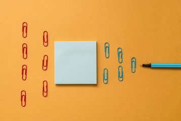 Colored blank sticky note clips binders gathered pen trendy cool background