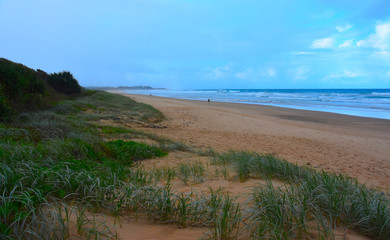 Fototapeta na wymiar Panoramic landscape of Arrawarra, Arrawarra Headland and beach in New South Wales, Australia on a cloudy and rainy day before storm.