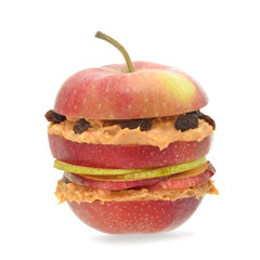 Healthy apple burger with peanut butter