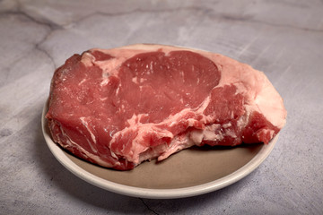 red veal chop on a plate