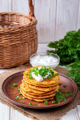 Pancakes with cheese with sour cream