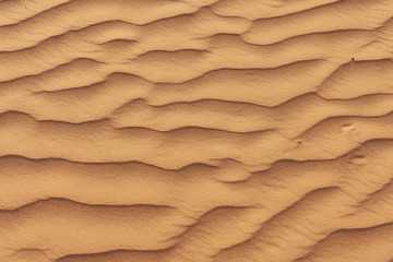 Fototapeta na wymiar Nahaufnahmen von Strukturen einer Sandwüste