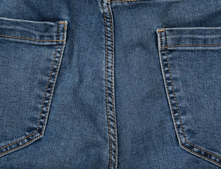 back pocket on blue jeans, full frame