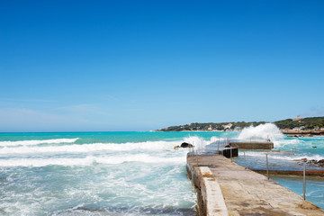 Beautiful azure sea and the rocky beach