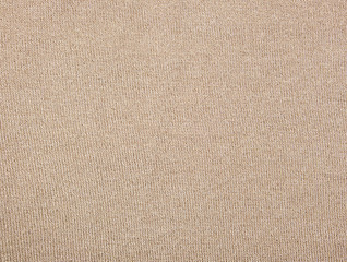 Fototapeta na wymiar fragment of golden cotton fabric for making clothes