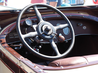 The steering wheel of an old car of the early twentieth century