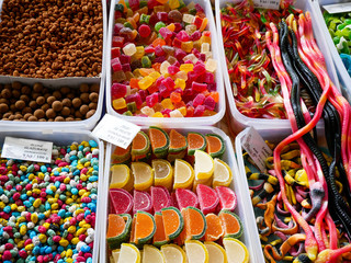 Variety of colorful jelly sweets and goodies at local fair.