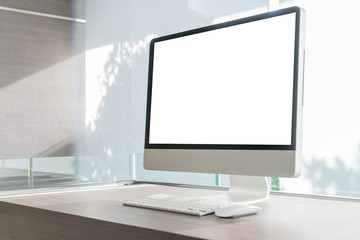 Pc or desktop computer monitor mockup with white blank screen, keyboard mouse in modern style for...