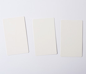 three empty rectangular paper white business business cards