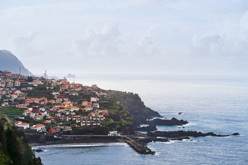 City on the coastline of Atlantic Ocean in Madeira island 