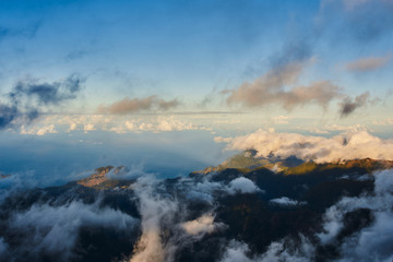Mountain view from pico de arieiro with mountains, ocean, clouds and blue sky
