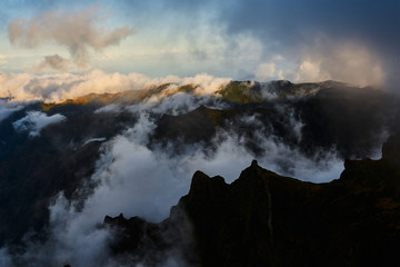 Mountain view from pico de arieiro with mountains, ocean, clouds and blue sky