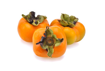 fresh ripe persimmons isolated on white background