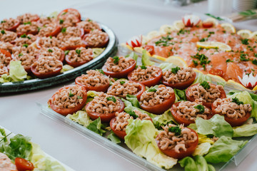 Delicious tomato shrimp closeup with green salad in a cold buffet