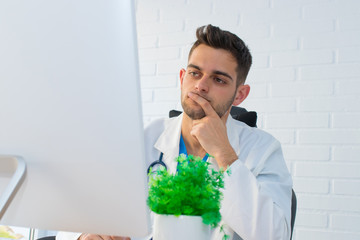 doctor with thoughtful expression in the clinic or consultation