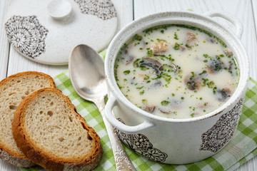 Homemade creamy mushroom soup with parsley.