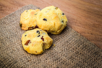 Raisin cookies and brown linen, free space