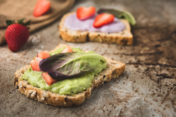 bread wholegrain mashed avocado and blueberry with strawberry 