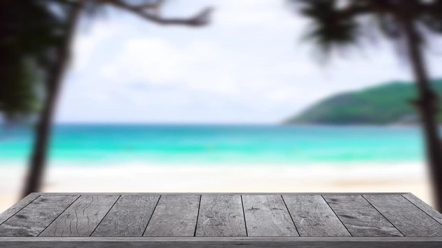 4K UHD 2160P- Wooden Texture Top Table Perspective On Blur Seascape Beach Sea Background.