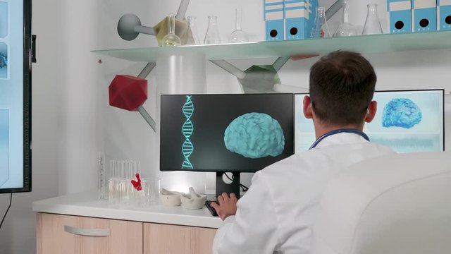 Revealing shot of modern research center with a doctor working in it. 3D brain scans and animated DNA strings